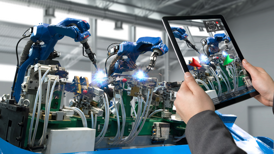 Revolutionizing Manufacturing: Detail how automation and robotics are transforming the factory floor and improving efficiency.